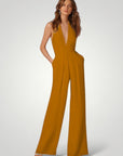 Combinaison Femme Élégante à Pantalon Large et Dos Nu